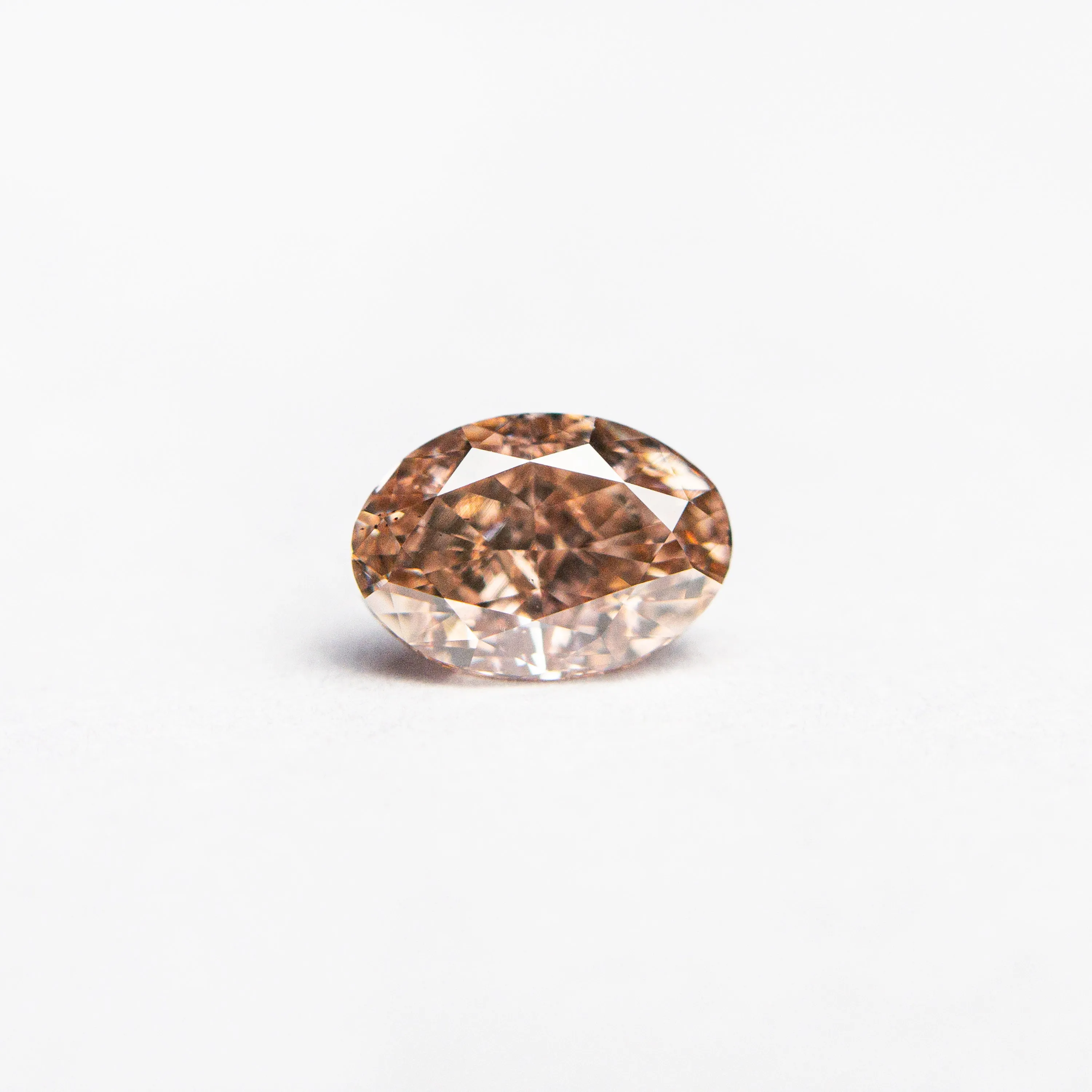 0.53ct 5.75x4.03x2.87mm GIA VS2 Fancy Brownish Orangy Pink Oval Brilliant  24158-01