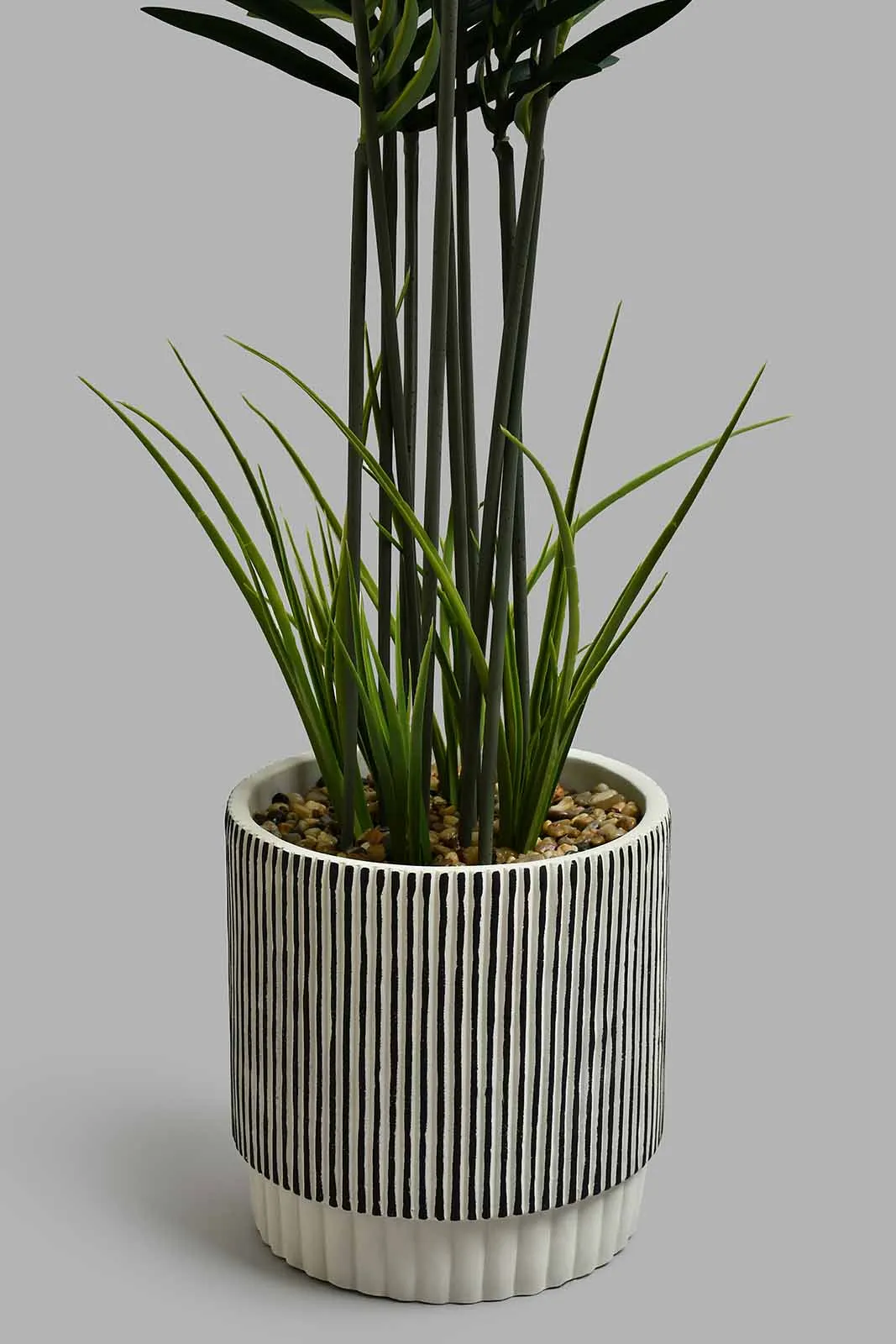 Brown Artificial Plant In Ceramic Vase