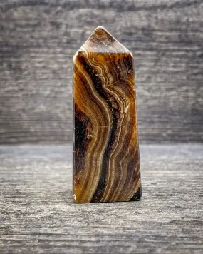 Brown Onyx Tower Carving, 131g