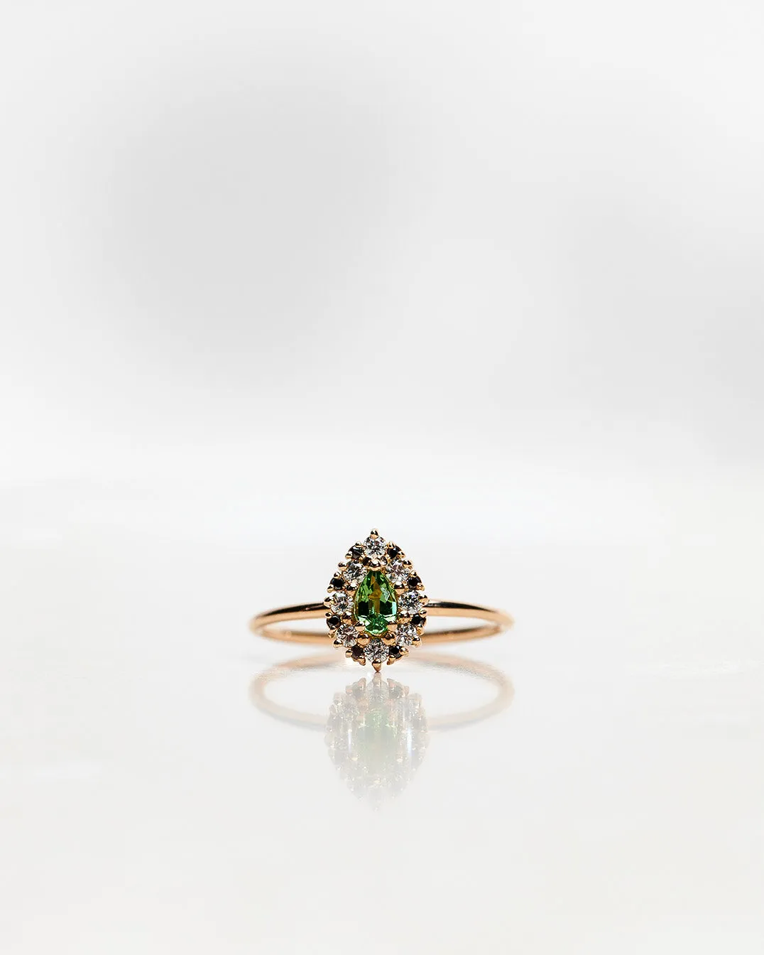 One-of-a-Kind Drop Ring with a Green Tourmaline Drop and a Halo of Black and White Diamond Brilliants