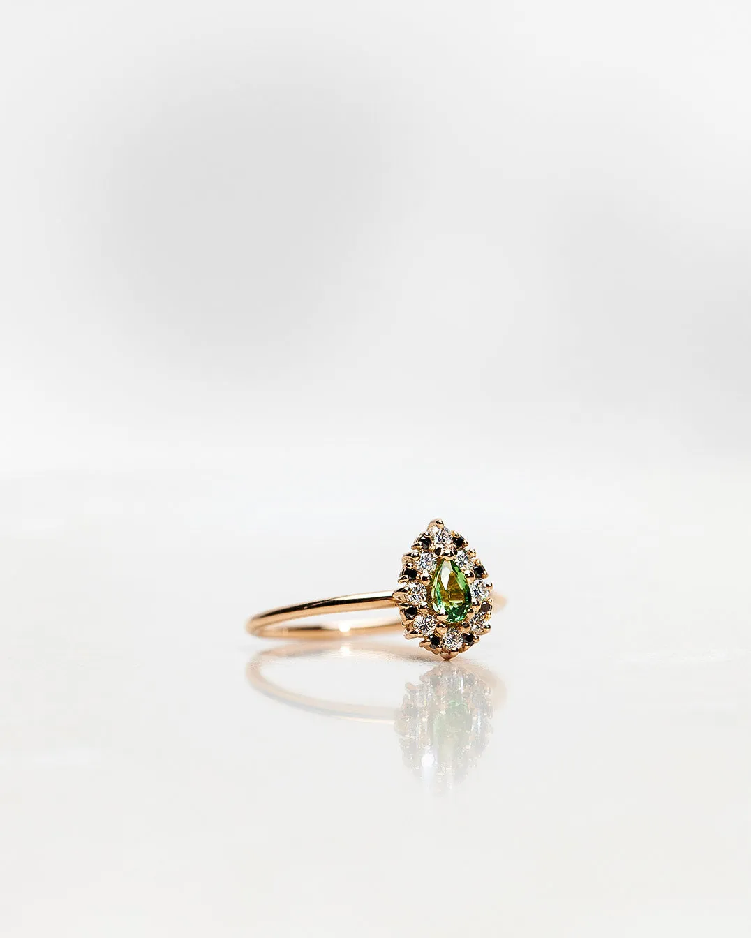 One-of-a-Kind Drop Ring with a Green Tourmaline Drop and a Halo of Black and White Diamond Brilliants